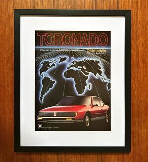 Framed 1986 Print Ad Toronado Oldsmobile Challenge the World